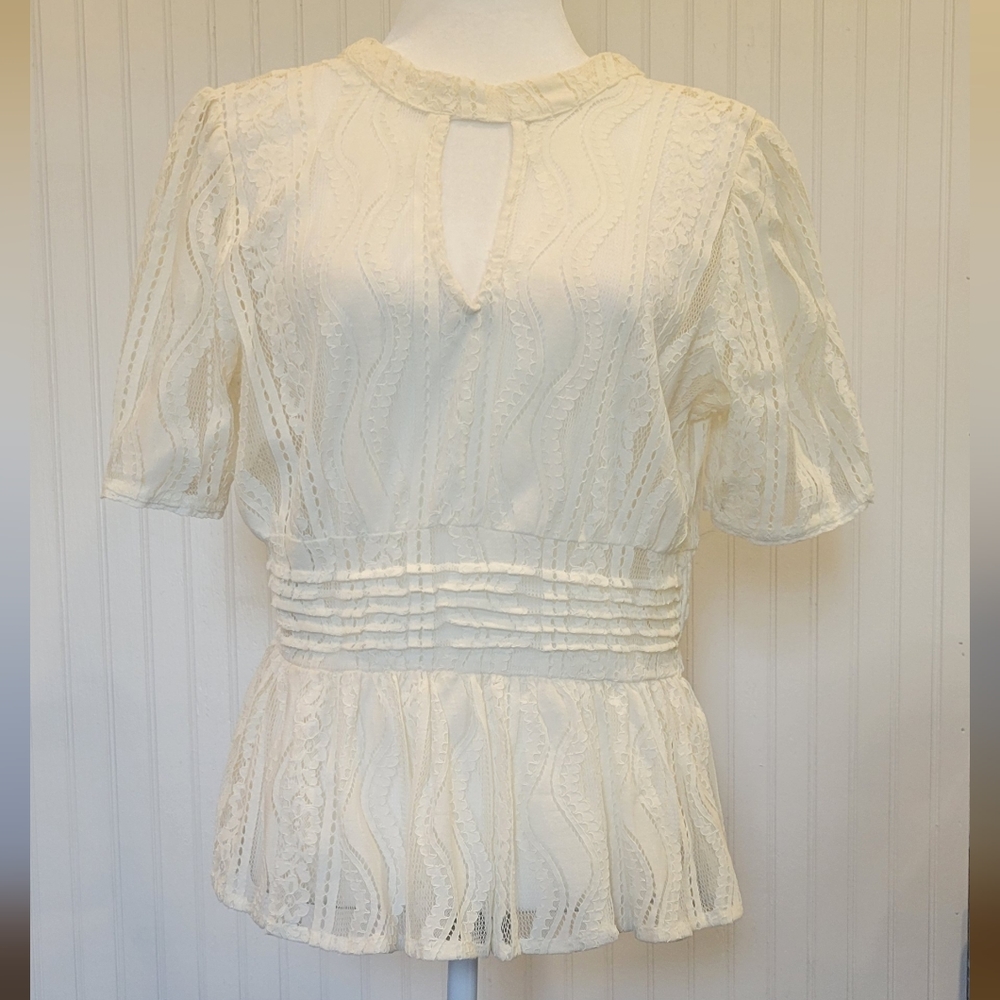 Coco and Jamison size lg beige laced peplum top. Never worn.